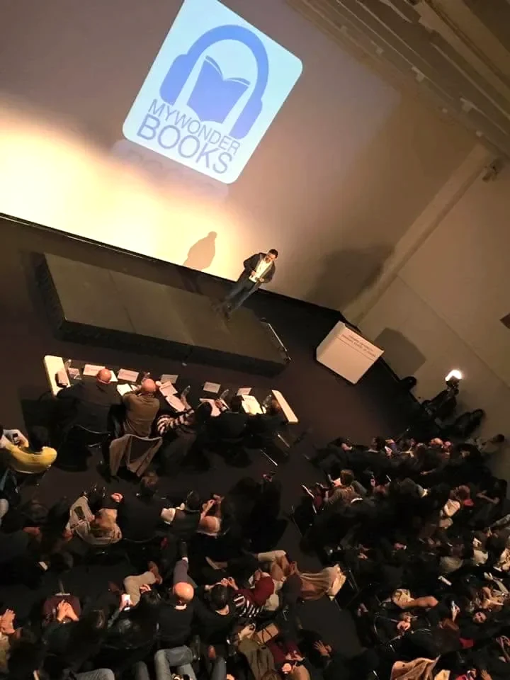 The MyWonderBooks logo on the presentation screen at Harvard Arab Weekend, 2016